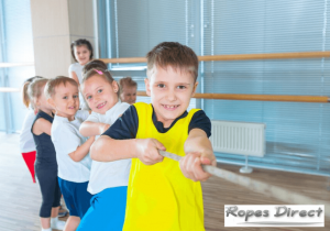 children playing with tug of war rope